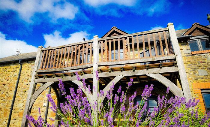 Three cottages offer balconies to relax on
